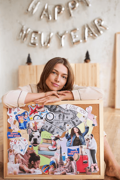 A female with her vision board covering her relationships perfectly