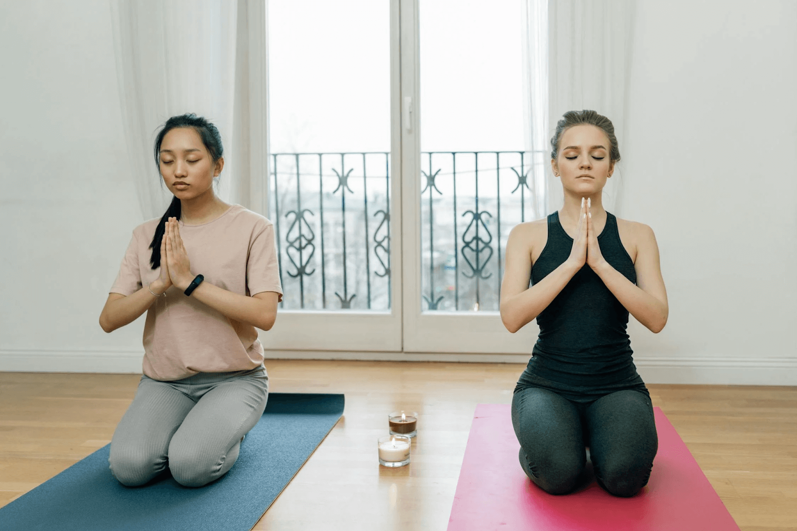 Women practicing the 4-7-8 breathing technique while doing yoga for enhanced relaxation and focus