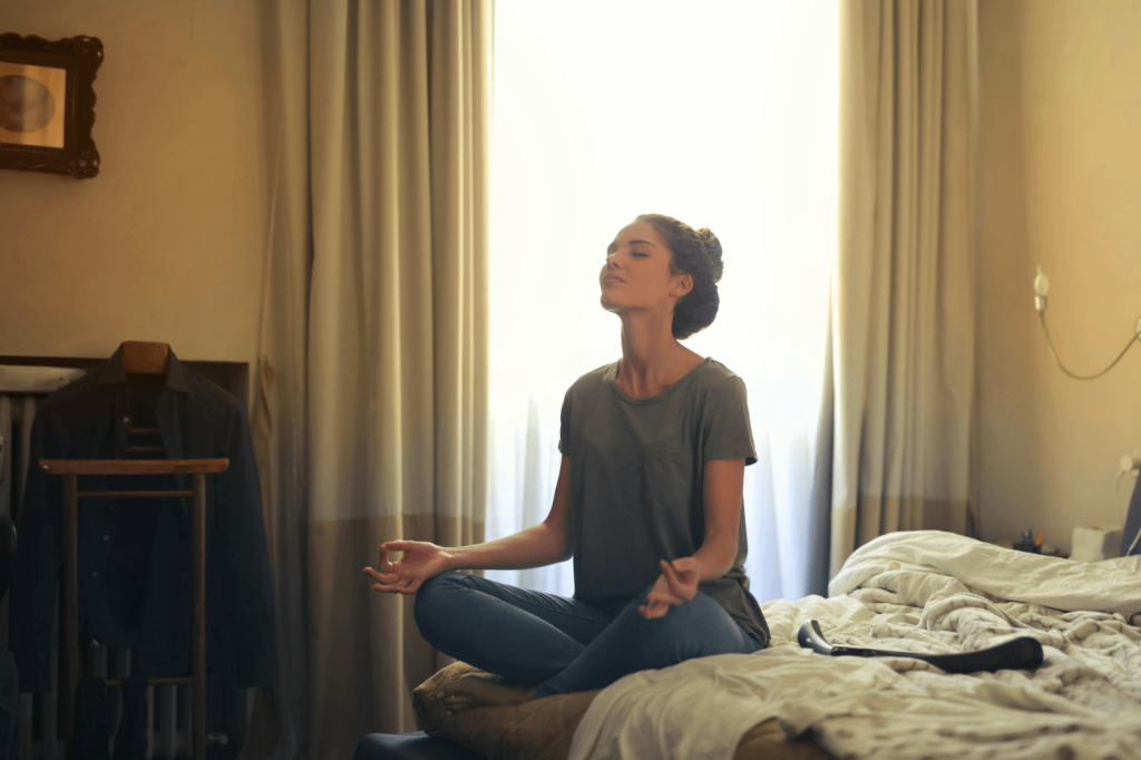 Woman practicing meditation with focus on positive affirmations for women